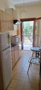 Kuchyňa alebo kuchynka v ubytovaní P.A.G Apartments
