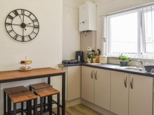 Η κουζίνα ή μικρή κουζίνα στο Britannic Chambers Apartment