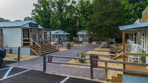 a group of tiny homes in a park at The Outpost in Grand Rivers
