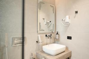 Koupelna v ubytování Hotel Natica