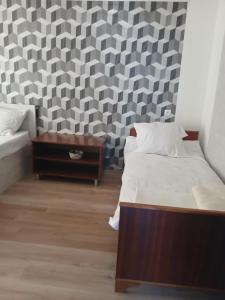 Voodi või voodid majutusasutuse HOTEL LukaRabati toas