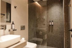 Koupelna v ubytování Hotel Natica