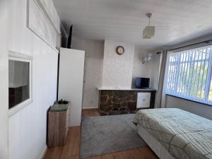 TV a/nebo společenská místnost v ubytování Private Double Room