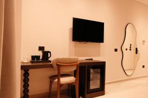 TV a/nebo společenská místnost v ubytování Hotel Natica