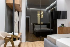 Postel nebo postele na pokoji v ubytování Mae Select Hotel
