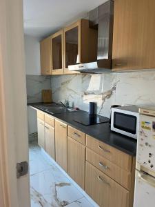 Η κουζίνα ή μικρή κουζίνα στο Apartment Abbey Wood