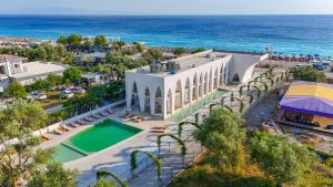an aerial view of a building next to the ocean at Ulin Boutique Hotel in Borsh