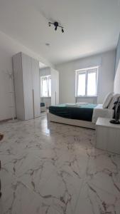 Postel nebo postele na pokoji v ubytování Casa Nerea - Camere Rooms