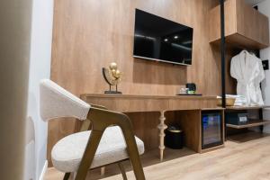 Kuchyň nebo kuchyňský kout v ubytování Mae Select Hotel