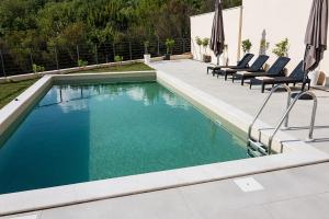 Bazén v ubytování Orange Tree Pool Villas - Sea View and Private Pool nebo v jeho okolí