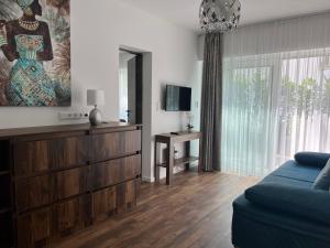 Un televizor și/sau centru de divertisment la Villa Bauhaus Dream Deluxe F