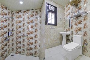 Koupelna v ubytování Super Hotel O Rishabh Inn