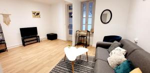 Χώρος καθιστικού στο Logement spacieux