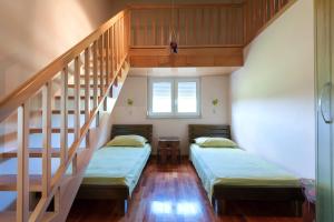 Ένα ή περισσότερα κρεβάτια σε δωμάτιο στο Holiday home Frankie Paradise