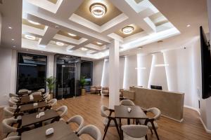 TV a/nebo společenská místnost v ubytování Mae Select Hotel