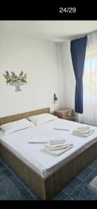 Ένα ή περισσότερα κρεβάτια σε δωμάτιο στο Casa mara