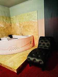 Voodi või voodid majutusasutuse Nowad Hotel toas