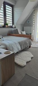 Ένα ή περισσότερα κρεβάτια σε δωμάτιο στο Hajlanderka +65 φωτογραφίες