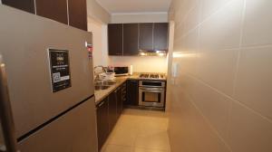 Dapur atau dapur kecil di Mahogany Suites by Skyreach Group