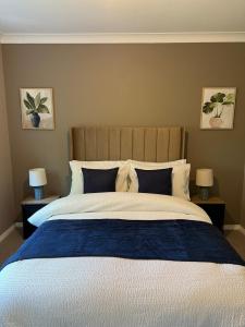 Ένα ή περισσότερα κρεβάτια σε δωμάτιο στο Waterside House