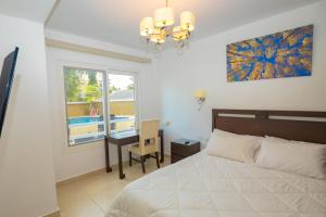 Katil atau katil-katil dalam bilik di Mahogany Suites by Skyreach Group