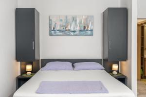 Postel nebo postele na pokoji v ubytování Apartment UGA