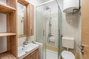 Koupelna v ubytování Apartment UGA