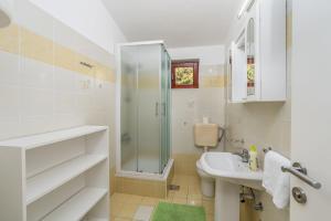 Koupelna v ubytování Apartment UGA