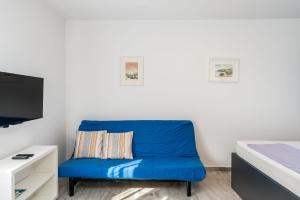 TV a/nebo společenská místnost v ubytování Apartment UGA