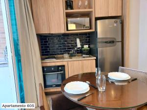 Dapur atau dapur kecil di Book Santos Estanconfor 603 & 605- Praia e Aconchego +37 gambar