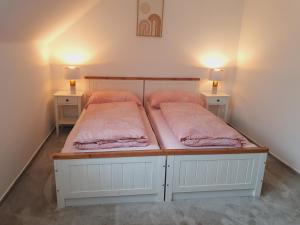 Voodi või voodid majutusasutuse Penzion Apartmány Libošovice toas