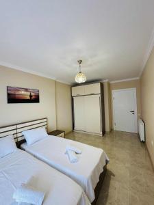 Postel nebo postele na pokoji v ubytování sea view rooms in Batumi