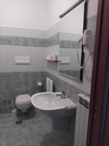 Koupelna v ubytování Hotel Turano
