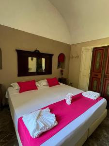 Una cama o camas en una habitación de I Giardini dei Sensi - Positano