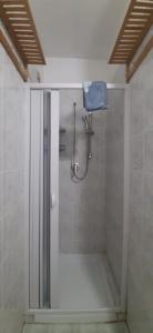 a shower in a bathroom with a walk in shower at Casa vacanza Colle Renazzo con terrazzo in collina 15 min. dal mare in Mafalda +41 photos