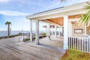 a house with a deck with a view of the ocean at Spinnaker 716 in Seabrook Island