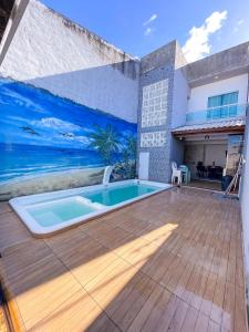 Πισίνα στο ή κοντά στο Casa De Praia Em Paracuru