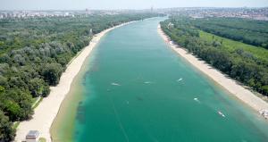 an aerial view of a river with boats in the water at Ada Lake new apartment in Belgrade