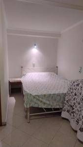 a bedroom with a bed in a room at Leon Studio Komi in Kalamoti