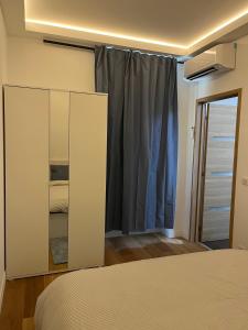 Ένα ή περισσότερα κρεβάτια σε δωμάτιο στο 2P Centre Ville