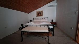 Posteľ alebo postele v izbe v ubytovaní Villa Perla