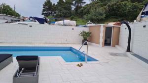 Πισίνα στο ή κοντά στο Apartments in Mundanije - Insel Rab 30445