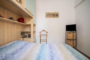 Postel nebo postele na pokoji v ubytování Casina di Nonna Faby