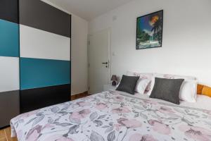 Postel nebo postele na pokoji v ubytování Apartman Marina