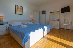 Postel nebo postele na pokoji v ubytování Apartment in Crikvenica 39237