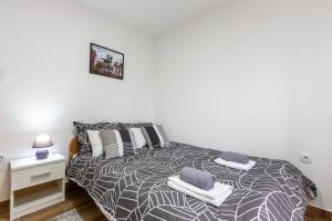 Postel nebo postele na pokoji v ubytování Apartman Marina