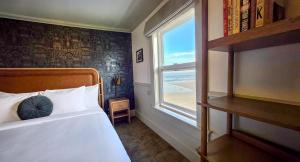Postel nebo postele na pokoji v ubytování Hotel Sylvia