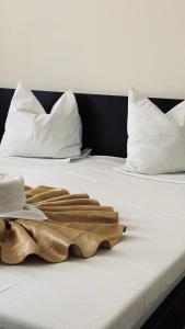 Postel nebo postele na pokoji v ubytování Hotel Dacia