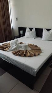 Postel nebo postele na pokoji v ubytování Hotel Dacia