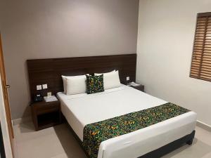 Posteľ alebo postele v izbe v ubytovaní Adis Hotels Prime